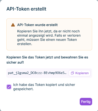 Zeigt den Dialog 'API-Token erstellt' mit dem einmalig angezeigten Token-Wert und einer Option zum Kopieren.