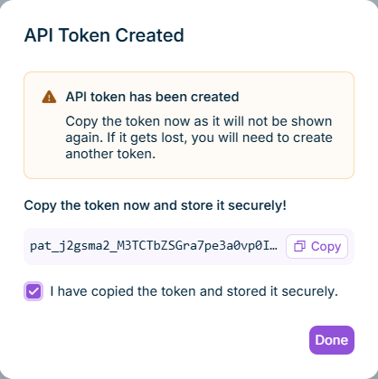 Shows the 'API Token Created' dialog with the one-time token value and a copy option.