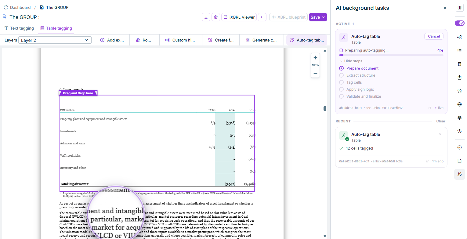 The 'AI background tasks' panel with a running 'Auto-tag table' task and two completed tasks